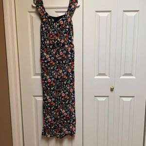 Floral and flattering tie front jump suit!